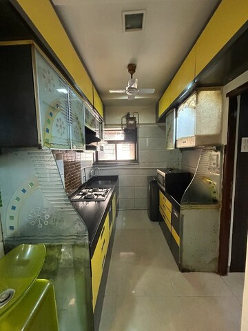 Kitchen in 2 BHK Apartment at Saptrishi Juhu Serene, Dn Nagar – for Rent