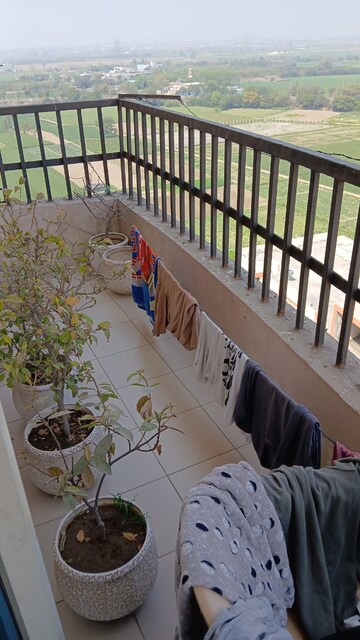 Balcony in 2.5 BHK Apartment at Nilaya Greens, Raj Nagar Extension – for Rent
