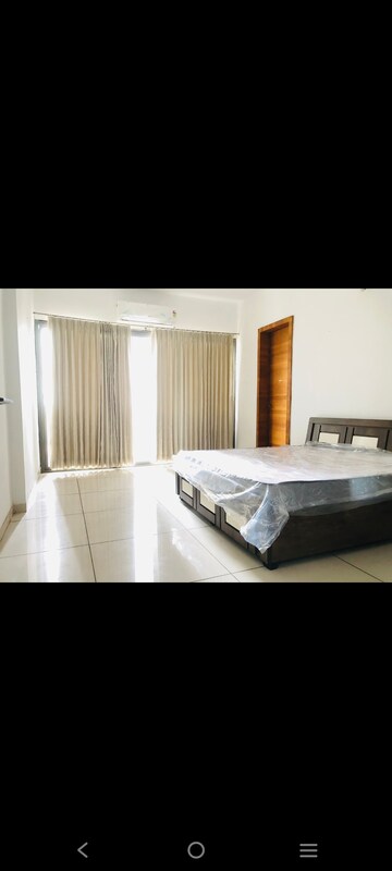 Bedroom in 4 BHK Apartment at JP Iscon Platinum, Bopal – for Rent