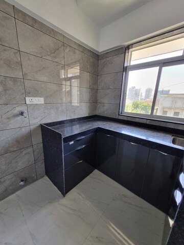 Kitchen in 1 BHK Apartment at Rishab Jay Sarang, Malad East – for Rent