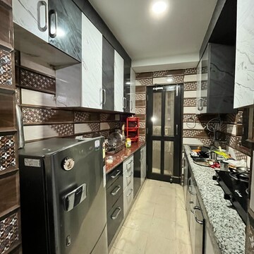 Kitchen in 2 BHK Apartment at Signature Global The Millennia, Garoli Kalan – for Rent