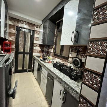 Kitchen in 2 BHK Apartment at Signature Global The Millennia, Garoli Kalan – for Rent