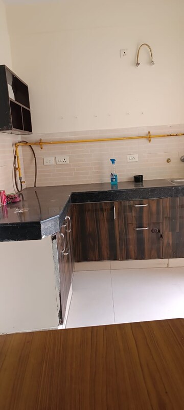 Kitchen in 2.5 BHK Apartment at Ashiana Palm Court, Raj Nagar Extension – for Sale
