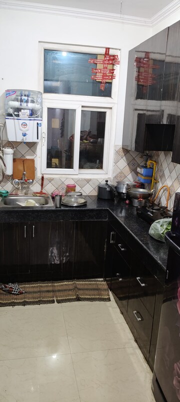 Kitchen in 2.5 BHK Apartment at Ashiana Palm Court, Raj Nagar Extension – for Sale