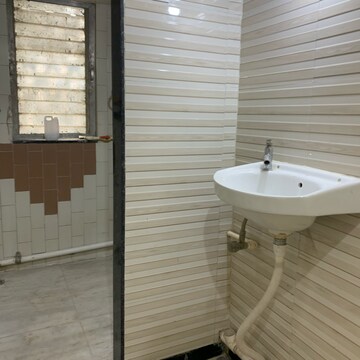 Bathroom in 1 BHK Apartment at Om Rishikesh CHS, Dalvi Nagar – for Rent