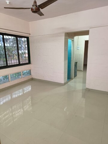 Room in 1 BHK Apartment at Greenfield Rocks CHS, Jogeshwari East – for Rent