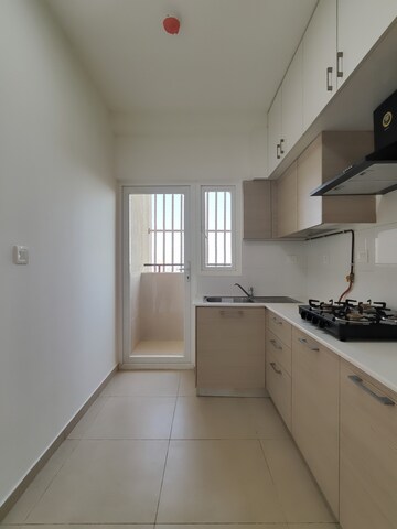Kitchen in 2 BHK Apartment at Bhartiya Nikoo Homes Phase 2, Thanisandra Main Road – for Sale