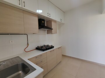 Kitchen in 2 BHK Apartment at Bhartiya Nikoo Homes Phase 2, Thanisandra Main Road – for Sale