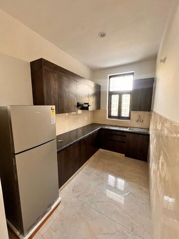Kitchen in 2 BHK Apartment at Ambience Creacions, Sector 22 – for Rent