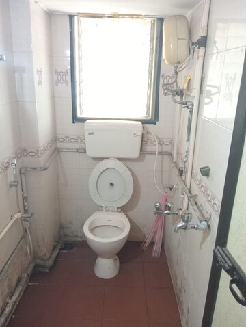 Bathroom in 1 BHK Apartment at Bindra Complex, Andheri East – for Rent