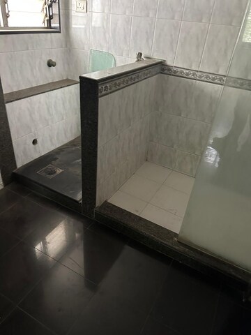 Bathroom in 2 BHK Apartment at White Lily CHS, Dadar West – for Rent