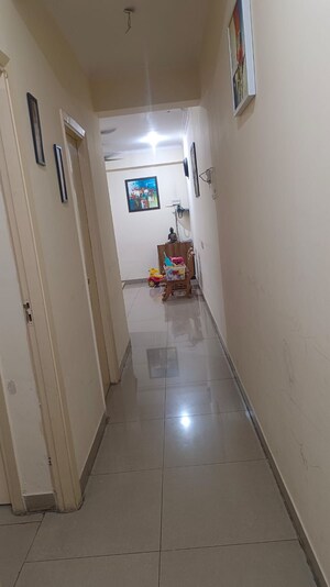 Building Lobby in 1 BHK Apartment at Nilaya Greens, Raj Nagar Extension – for Sale