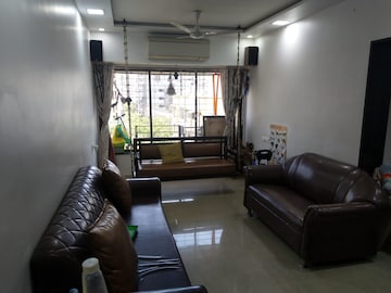 Living Room in 2 BHK Apartment at Riddhi Garden, Malad East – for Rent
