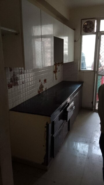 Kitchen in 2 BHK Apartment at Nitishree Aura Chimera, Raj Nagar Extension – for Rent