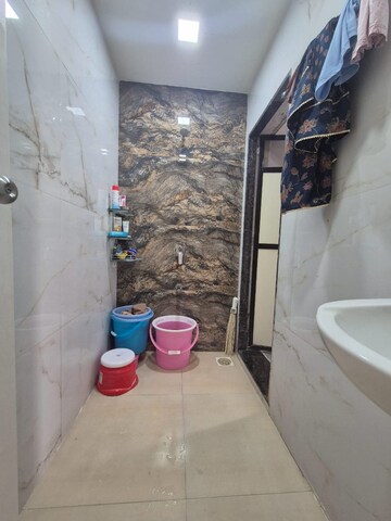 Bathroom in 2 BHK Apartment at VM Mohan Palms, Seawoods – for Rent