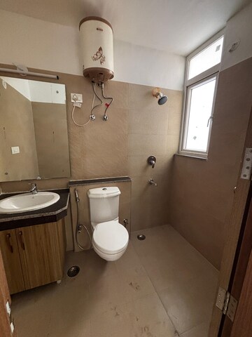 Bathroom in 4 BHK Apartment at Gaur Atulyam, Omicron I Greater Noida – for Rent