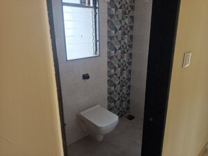 Bathroom in 3 BHK Apartment at Sheetala Sheetal Ganga Gobind, Santacruz East – for Sale
