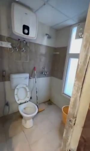 Bathroom in 2 BHK Apartment at Nilaya Greens, Raj Nagar Extension – for Sale