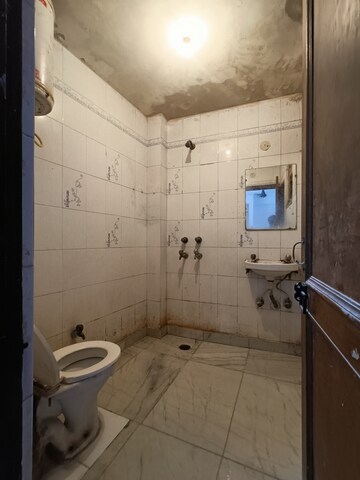 Bathroom in 2 BHK Builder Floor at Khirki Extension – for Rent