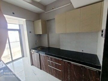 Kitchen in 2 BHK Apartment at Amar Vinay Heritage, Mira Road – for Sale