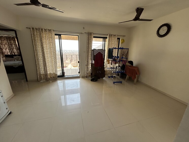 Living Room, pride-world-city-brooklyn 2 Bedroom 672 Sq.Ft. Apartment In Charholi Budruk Pune 8436376