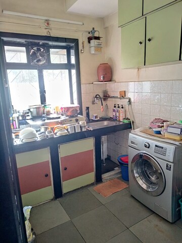 Kitchen in 1 BHK Apartment at Raheja Township, Malad East – for Sale