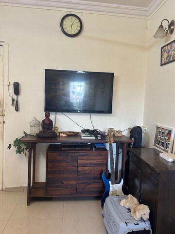 Living Room in 1 BHK Apartment at Janseva CHS, Goregaon West – for Rent