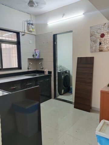 Kitchen in 2 BHK Apartment at Cosmos Jewels, Ghodbunder Road – for Rent