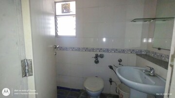 Bathroom in 2 BHK Apartment at Raheja Garden Estate, Midc Colony – for Rent