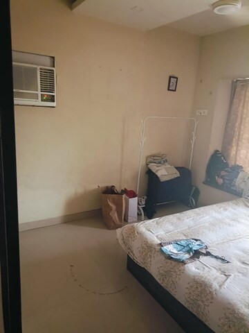 Living Room in 2 BHK Apartment at Palash Towers, Andheri West – for Rent
