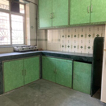 Kitchen in 1 BHK Apartment at Om Rishikesh CHS, Dalvi Nagar – for Rent