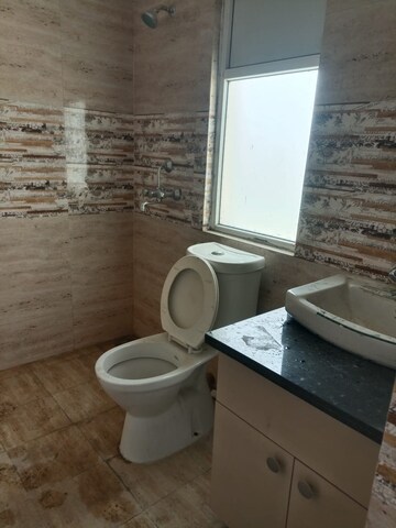 Bathroom in 3 BHK Apartment at Amrapali Golf Homes, Sector 4, Greater Noida – for Rent