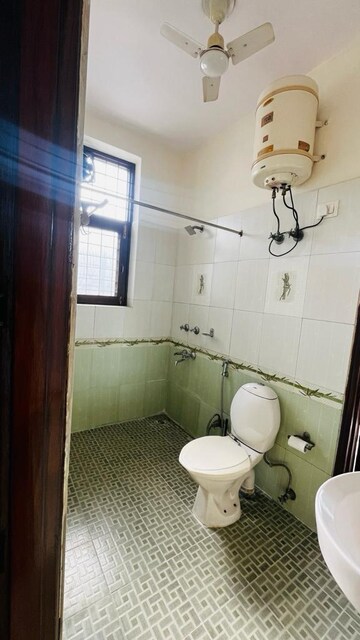 Bathroom in 3 BHK Apartment at Chittaranjan Park – for Rent