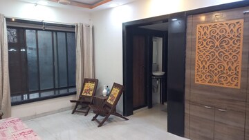 Living Room in 1 BHK Apartment at Highland Park CHS, Kandivali West – for Rent