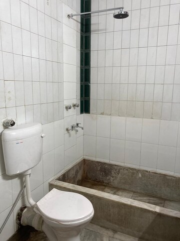 Bathroom in 4 BHK Apartment at Boutique Residential Apartments C-253, Defence Colony – for Rent