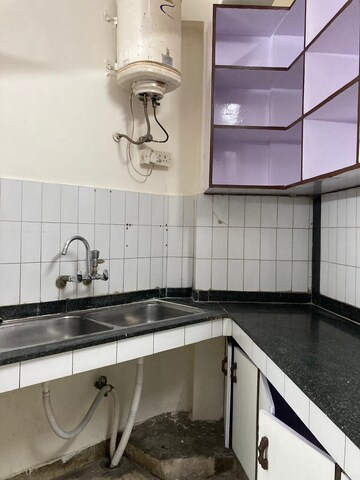 Kitchen in 4 BHK Apartment at Boutique Residential Apartments C-253, Defence Colony – for Rent