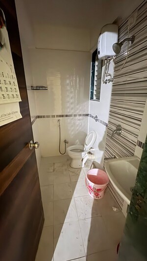 Bathroom in 2 BHK Apartment at Cosmos Jewels Solitaire, Ghodbunder Road – for Sale