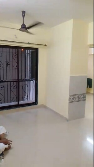 Living Room in 2 BHK Apartment at Andheri West – for Sale