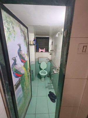 Bathroom in 1.5 BHK Apartment at STC Employees CHS, Andheri East – for Sale