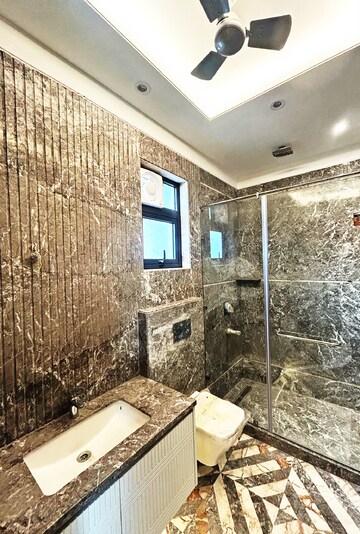 Bathroom in 4 BHK Builder Floor at Anand Lok – for Sale