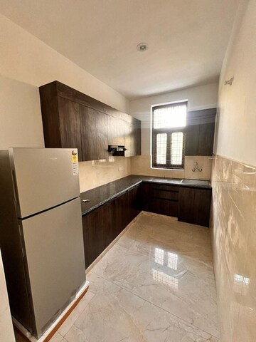 Kitchen in 2 BHK Apartment at Ambience Creacions, Sector 22 – for Rent
