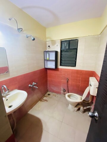 Bathroom in 2 BHK Apartment at Hill Mist Harmony Apartment, Kondhwa – for Rent