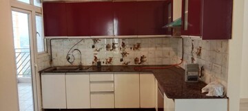 Kitchen in 3 BHK Apartment at Gaur Sportswood, Sector 79 – for Rent