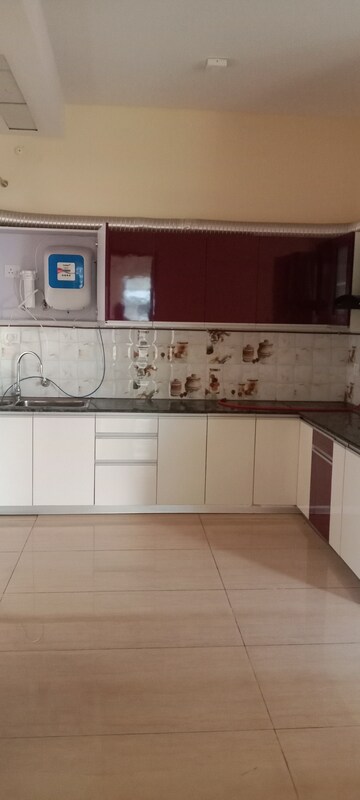 Kitchen in 3 BHK Apartment at Gaur Sportswood, Sector 79 – for Rent