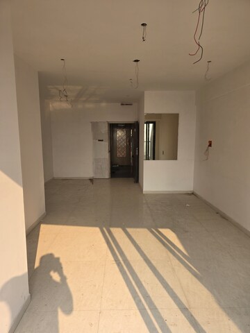Living Room in 2 BHK Apartment at Mahalaxmi – for Sale