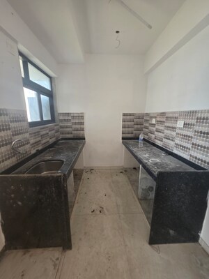 Kitchen in 2 BHK Apartment at Mahalaxmi – for Sale