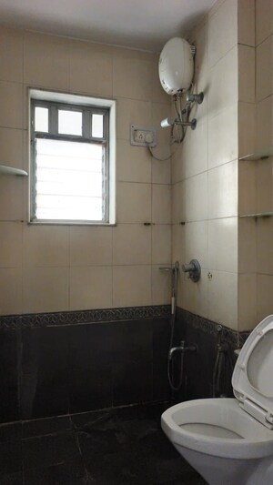 Bathroom in 3 BHK Apartment at Soham Garden, Manpada – for Sale