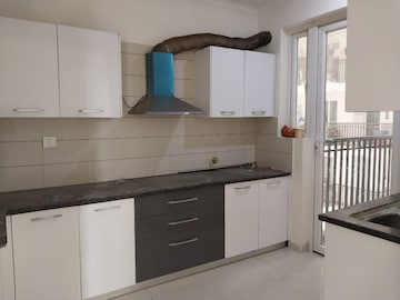 Kitchen in 3 BHK Apartment at Paradigm Business Hermitage Park, Dhakoli Village – for Sale