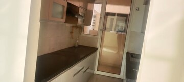 Kitchen in 2 BHK Apartment at Mahagun Mirabella, Sector 79 – for Sale