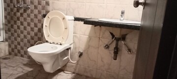 Bathroom in 2 BHK Apartment at Mahagun Mirabella, Sector 79 – for Sale